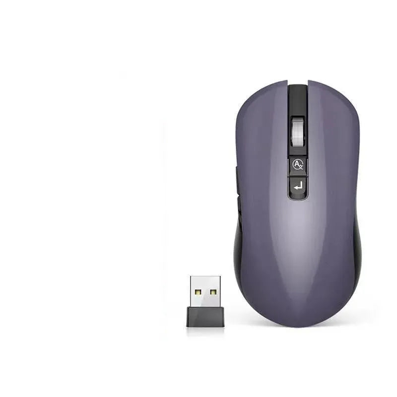 IFLYTEK wireless gaming mouse with seven buttons on a desk next to a laptop, showing its black plastic design and USB receiver.