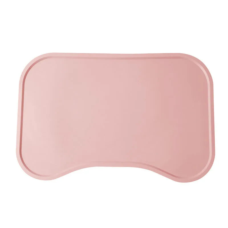 Waterproof silicone dog food mat with raised edges in green colour, non-slip base for pet bowls