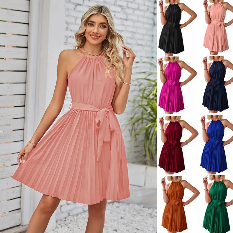 Women's black chiffon halter dress with pleated skirt and waist belt laid flat