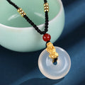 999 silver brave troops white agate peace buckle pendant necklace on neutral background