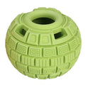 Green natural rubber dropping ball dog toy with hollow centre for treat dispensing