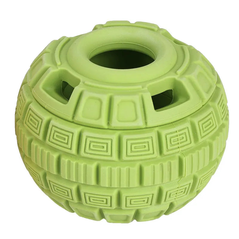 Green natural rubber dropping ball dog toy with hollow centre for treat dispensing