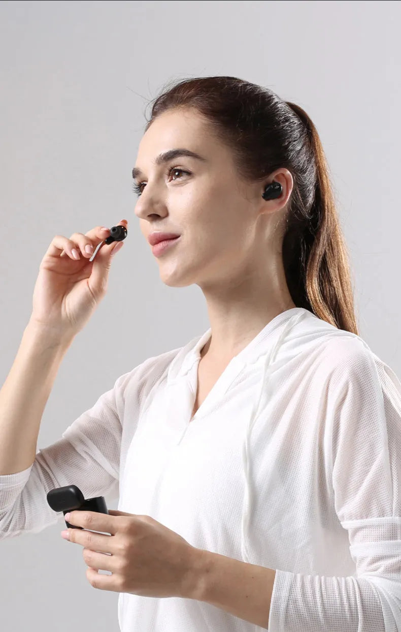 True wireless Bluetooth sports headset in pearl white or magic night black with waterproof design
