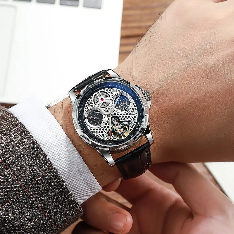 Automatic men's business watch with luminous hands on a steel bracelet.