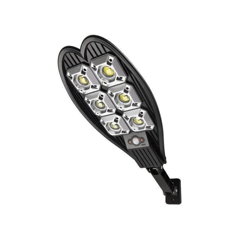 Outdoor solar garden lamp with 6-eye sword design and remote control on a grassy pathway.