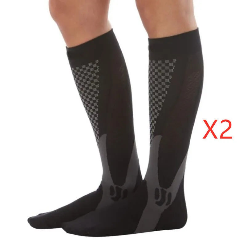 Unisex graduated compression socks in various colours with size measurement details