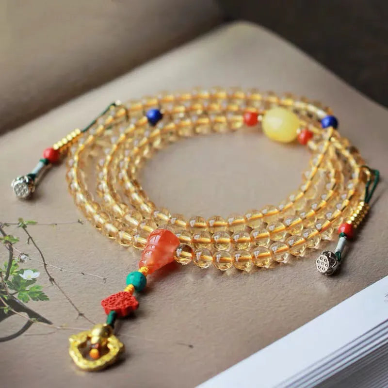 Brazilian natural citrine bracelet with yellow and red body colour, 1mm bead diameter