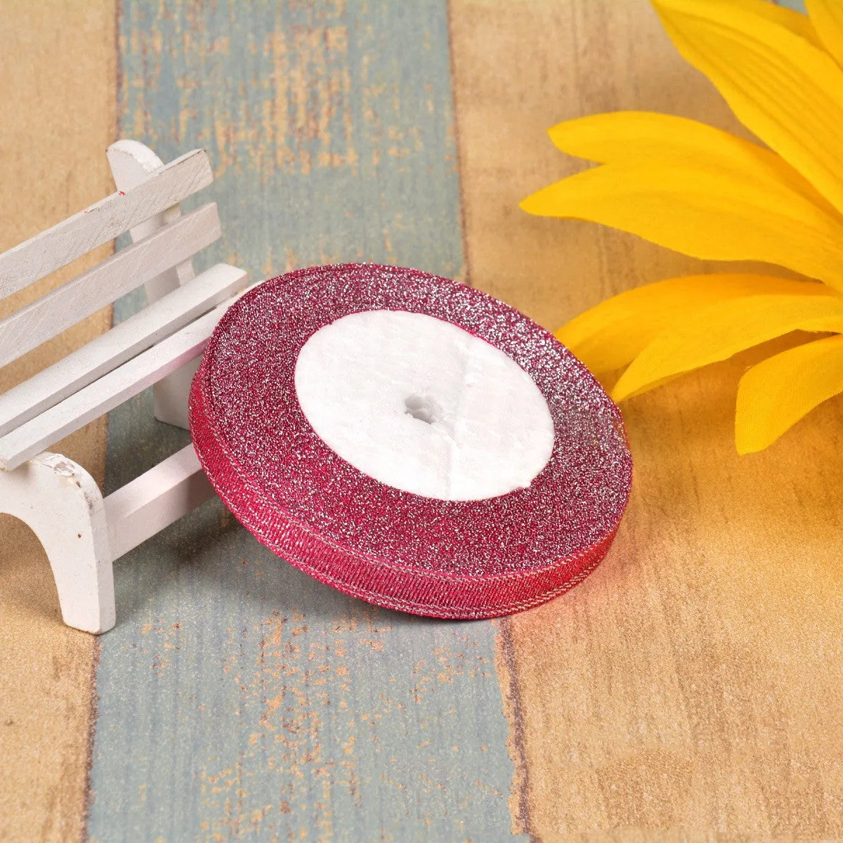 Colourful green onion pattern polyester ribbon spool with metallic gold or silver wire detailing.