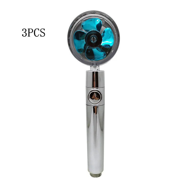 Blue handheld shower head with stop button and turbo nozzle on a chrome bracket.