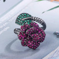 Geometric flower personality ring with gold-plated copper construction and red corundum centrepiece