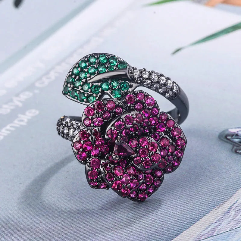 Geometric flower personality ring with gold-plated copper construction and red corundum centrepiece