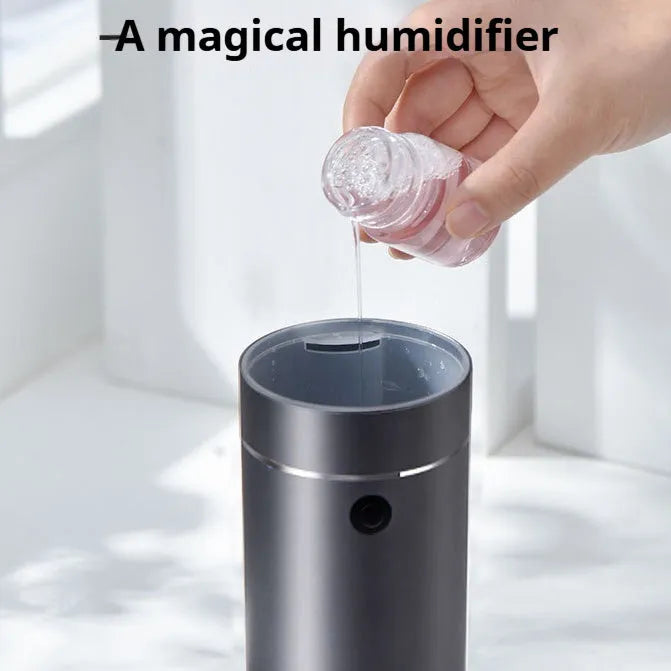 Mini car heavy fog aromatherapy humidifier in dark grey column shape with USB cable
