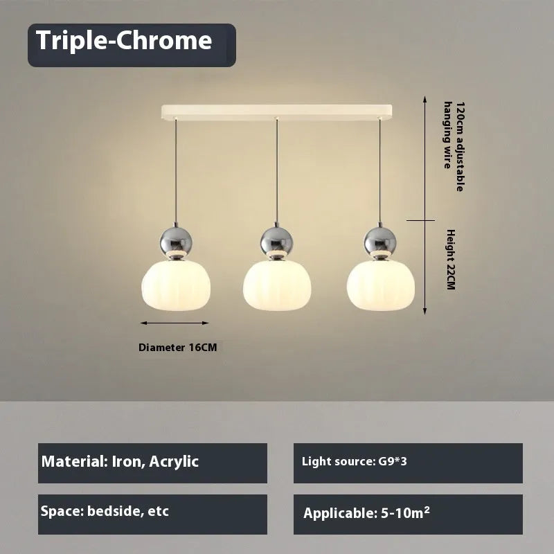 Creative alloy pumpkin chandelier light fixture for ceiling mounting in cream, red, green, chrome, or walnut finish.
