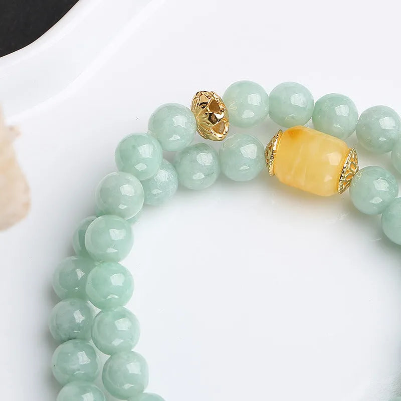 Double-layer women's bracelet with jade round beads and beeswax barrel beads in geometric retro design