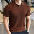 Men's slim fit polo shirt with button-down Henry collar in lightweight polyester fabric.