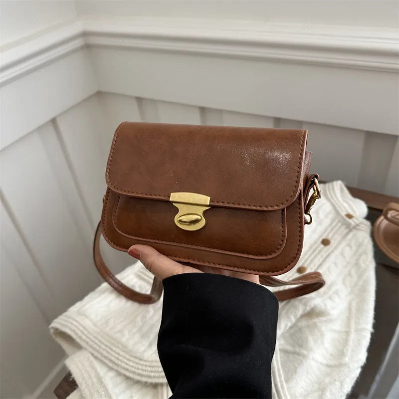 Retro square handbag in soft PU leather with horizontal suitcase shape design