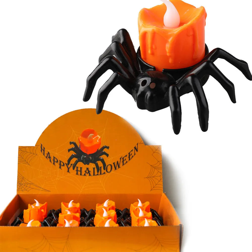 Plastic Halloween spider candlestick ornament with battery-operated candle light.