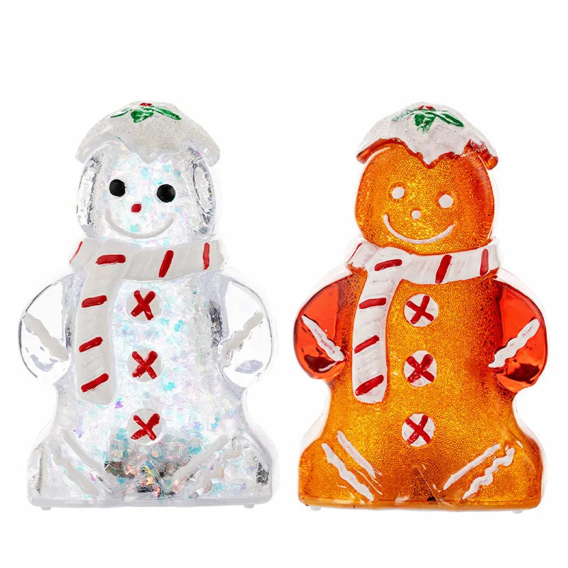 Glowing LED Christmas ornament of a gingerbread man with a red scarf.