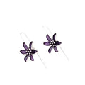 A pair of purple floral alloy earrings with a retro design on a white background.