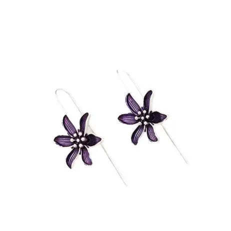 A pair of purple floral alloy earrings with a retro design on a white background.