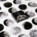 Boxed set of 45 black moon phase and calendar planet self-adhesive stickers.