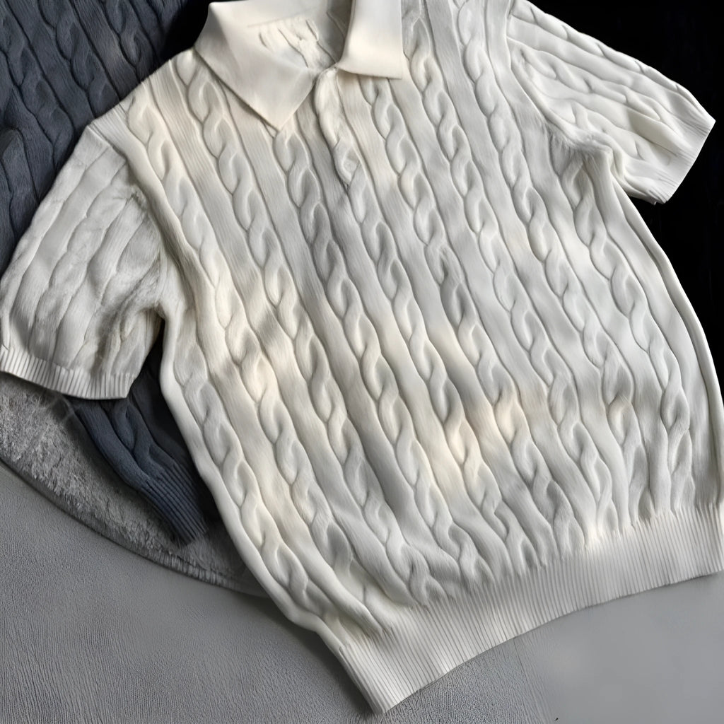 Man wearing a grey knitted short-sleeve T-shirt made from twisted combed cotton blend.