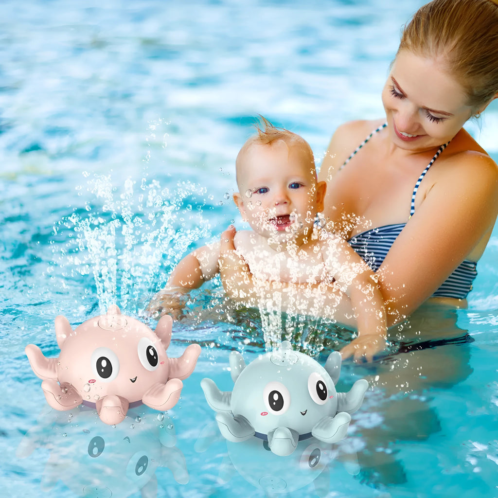 Blue octopus-shaped children's bath toy that automatically sprays water and flashes lights.