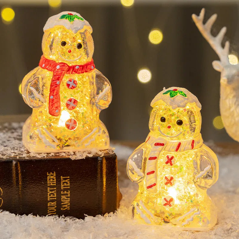 Glowing LED Christmas ornament of a gingerbread man with a red scarf.