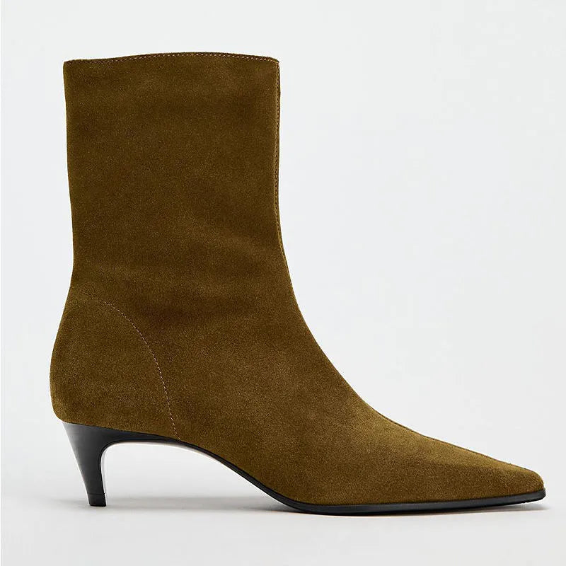 Women's brown square toe ankle boots with a side zip and a stiletto kitten heel on a white background.