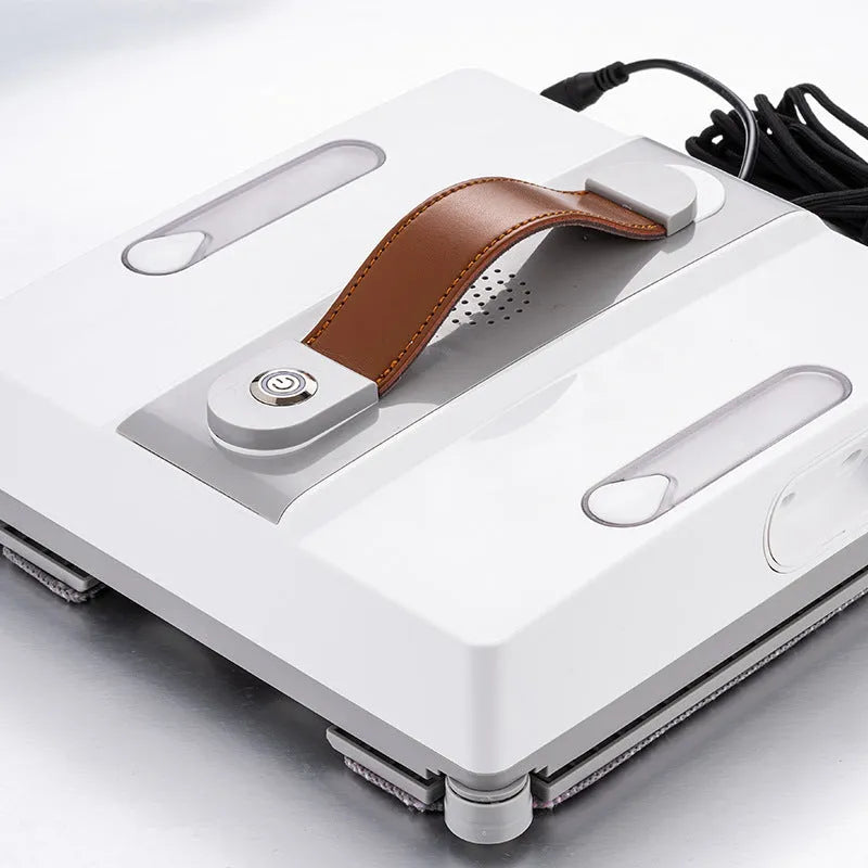 White intelligent window cleaning robot device for automated high-rise window washing.