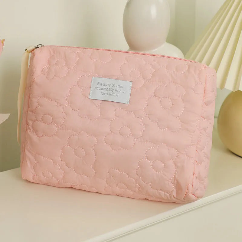 Quilted candy colour silk cosmetic bag for women showing pink, yellow, blue, white and green options