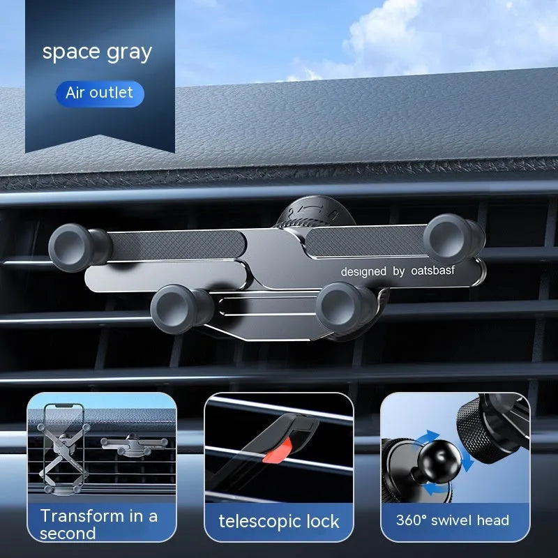 Silver aluminium alloy car phone holder with snap-on bracket mounted on a car air vent