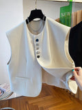 Loose-fitting waistcoat dress with pockets in solid colour polyester fabric