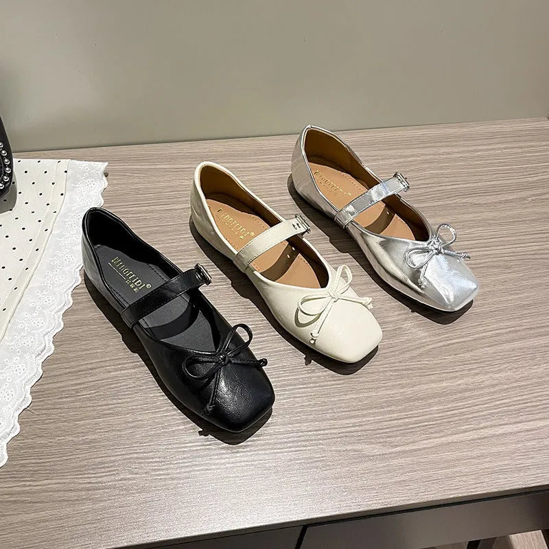 Mary Jane flat pumps in satin with rhinestone and tassel decoration, low heel, available in black beige and silver