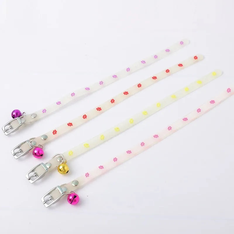 Luminous cat collar with adjustable silicone strap and metal bell in one of four patterns