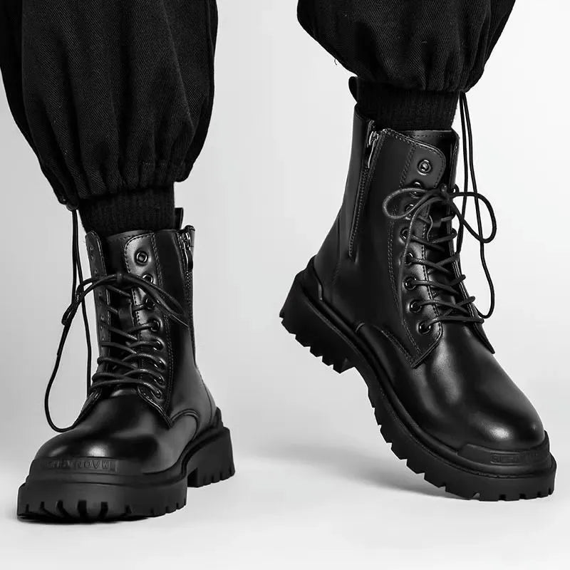 Men's black mid-top waterproof boots with a rubber sole on a grey background.