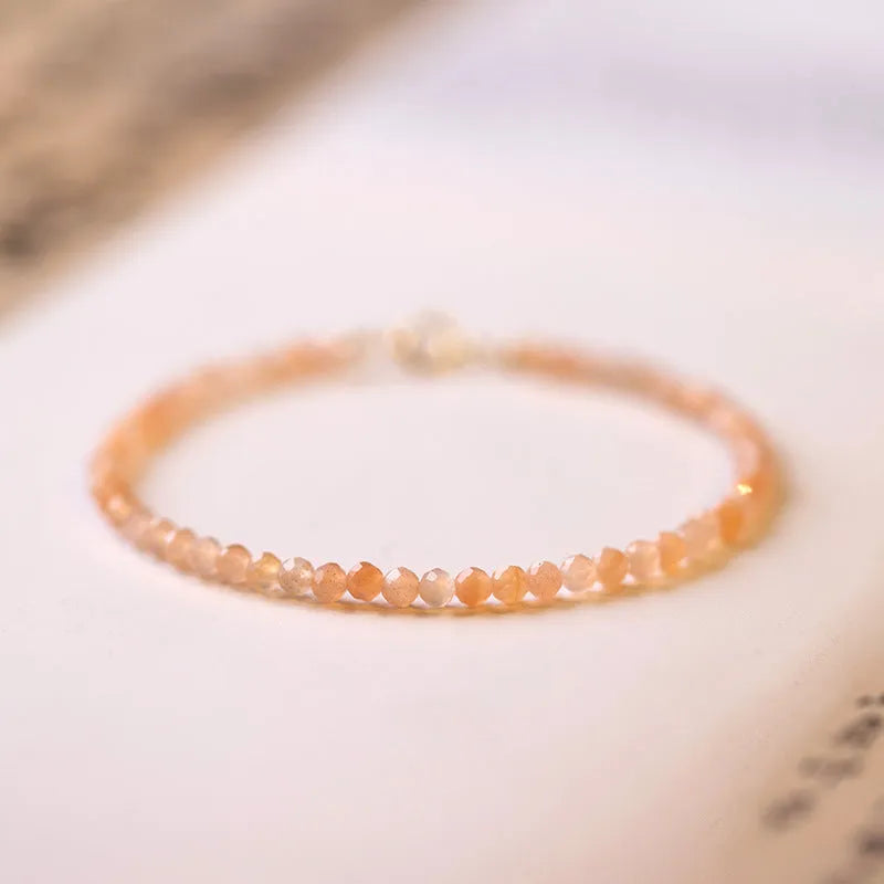 Ultra-thin 3mm sunstone bead bracelet with natural crystal beads on wrist