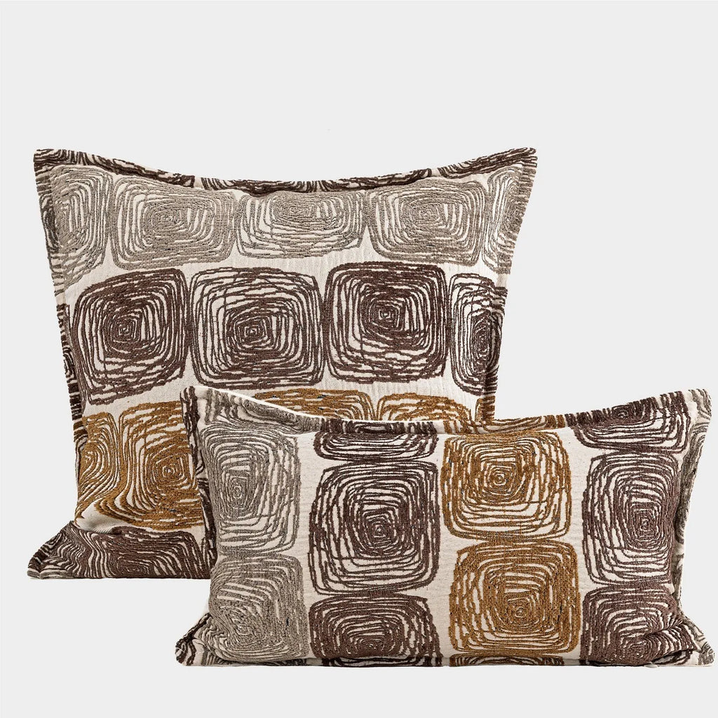 Cream and coffee coloured abstract coil pattern pillow cover in square and lumbar sizes.
