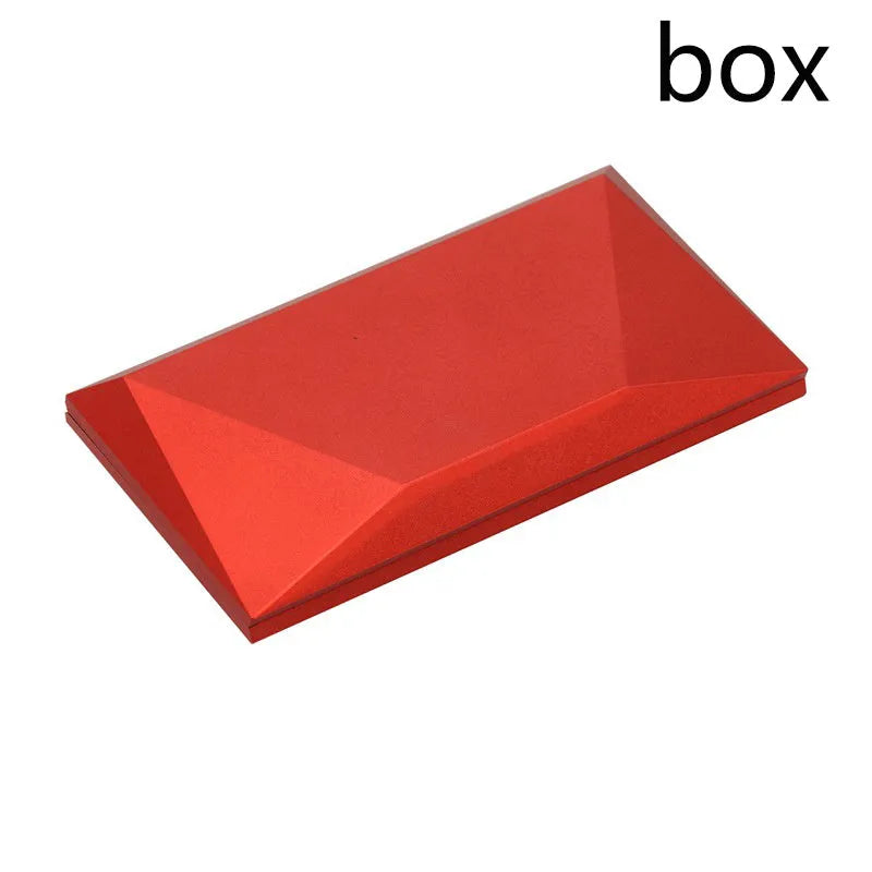 Red heart-shaped rotating ring box with 3D white rose decoration on top.