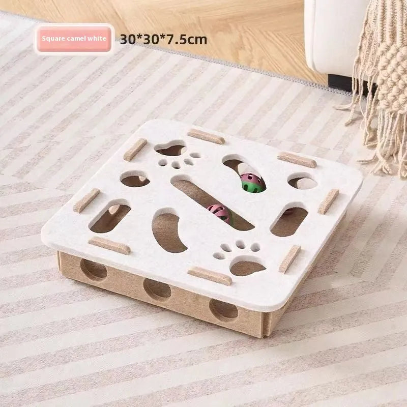 Green brown felt cat toy box with a square hole, measuring 30 cm, on a wooden floor.
