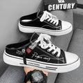 Men's canvas slip-on casual shoes in black colour with round toe and PVC sole