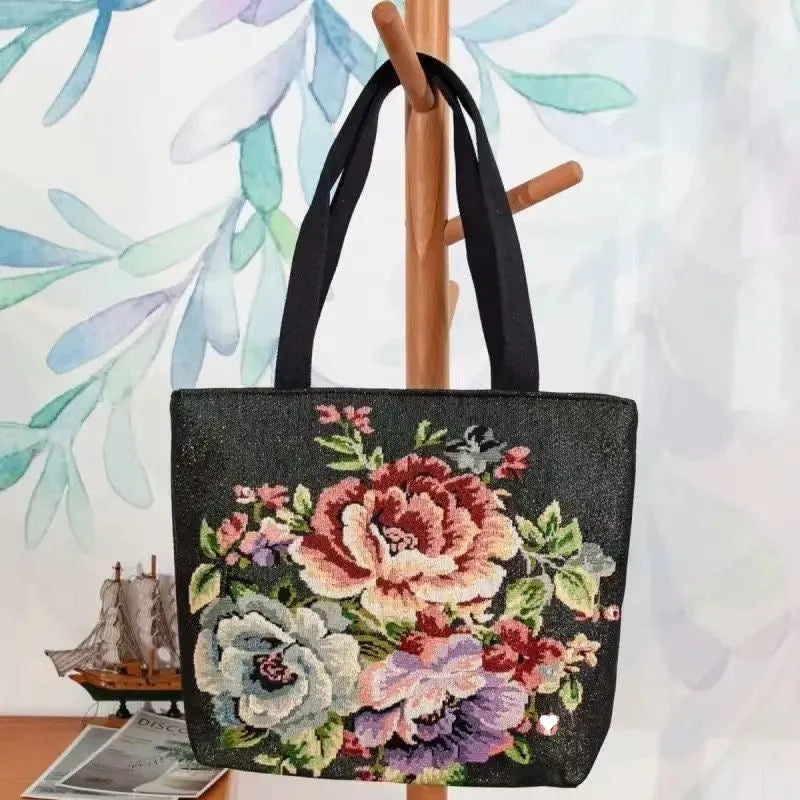 Double-sided gold wire embroidered canvas handbag in small, medium, and large sizes with patterned options.