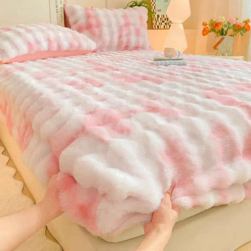 Class A milk fiber fitted sheet with rabbit plush in clear blue, showing elastic edges and smooth surface