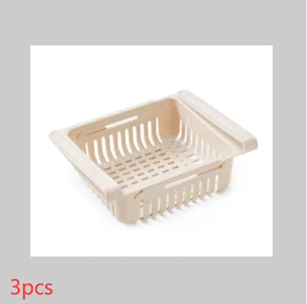Blue telescopic plastic storage basket for refrigerator organisation with fruits and vegetables inside.