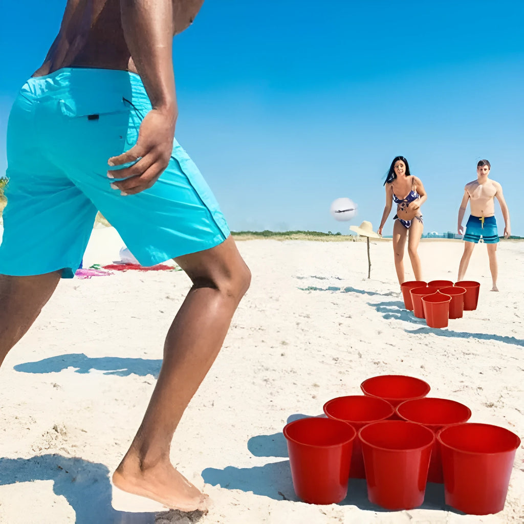 Red plastic beach bucket outdoor game set for beach throwing play