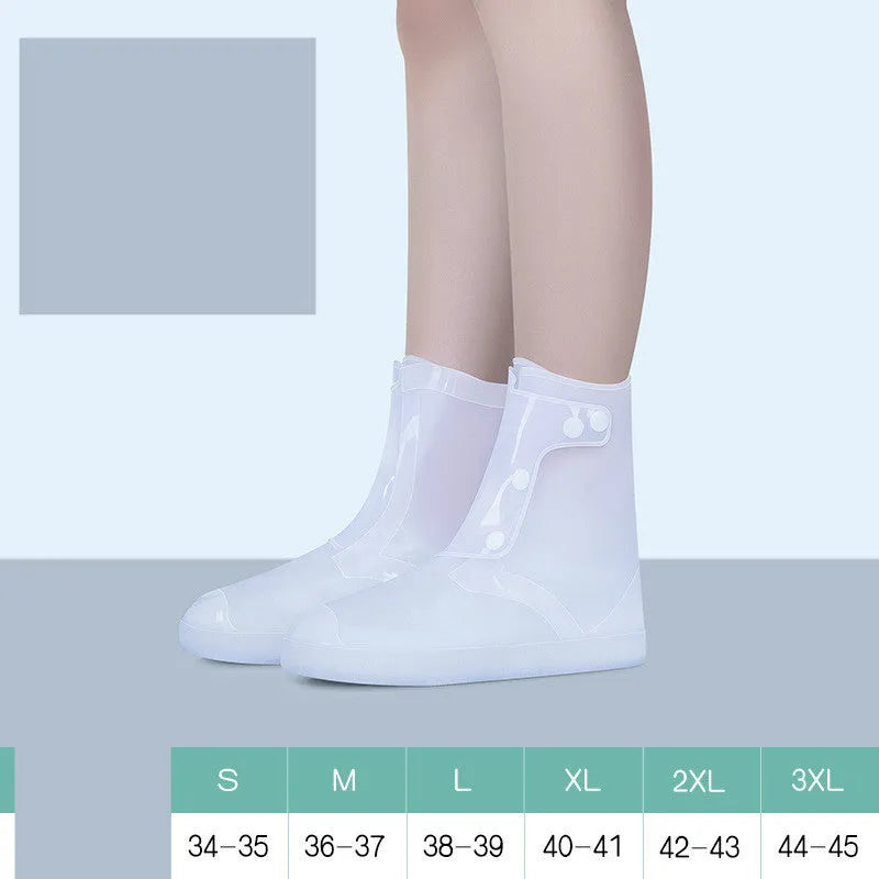 White high-top PVC reusable shoe covers for women, shown on feet.