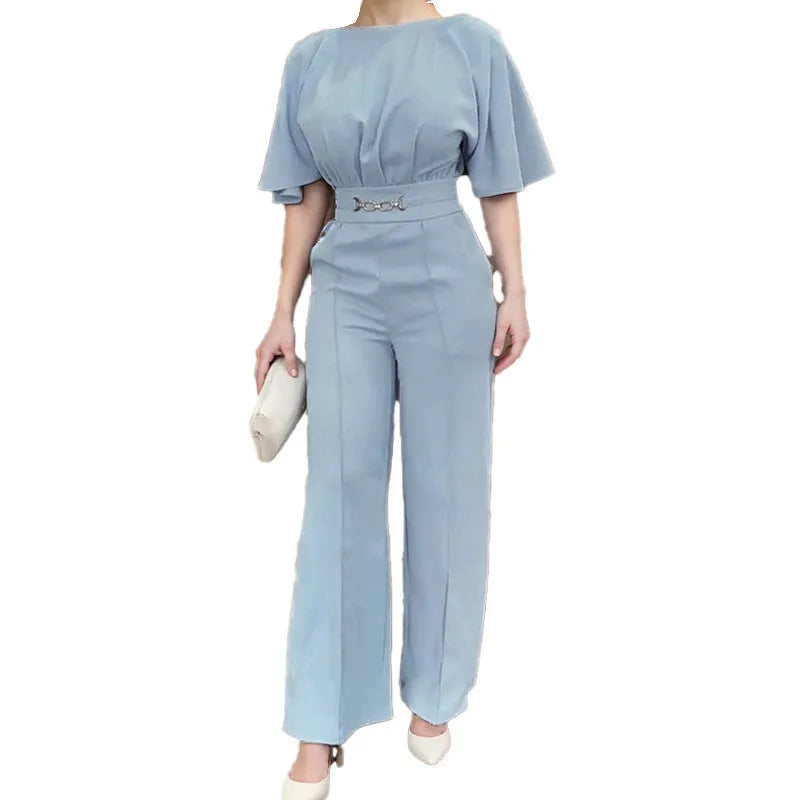 Blue men's polyester suit set with long-sleeved jacket and trousers on a hanger.