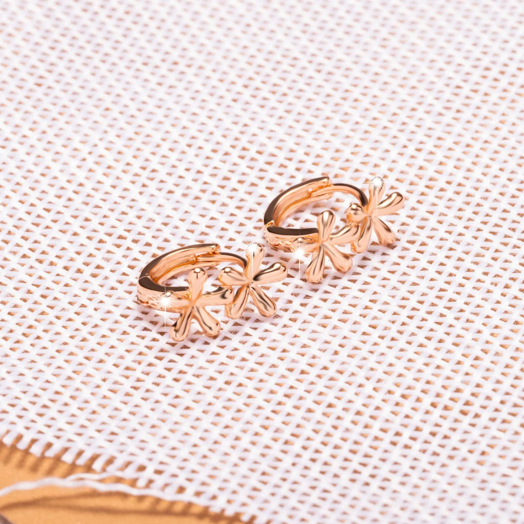 Rose gold electroplated waterdrop flower earrings with circular 20mm floral design on a white background.