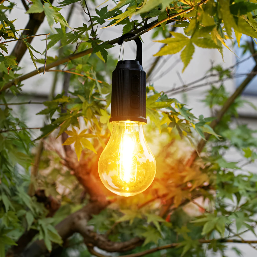 Five solar-powered lantern-shaped outdoor lights with warm white LED illumination