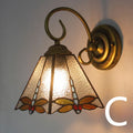 Coloured stained glass wall mounted light fitting for corridors, available in multiple style and colour options.